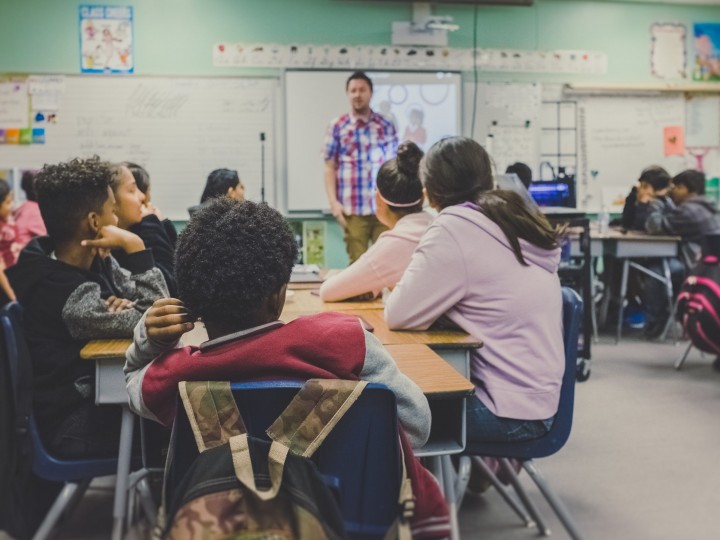 Teacher teaching students
